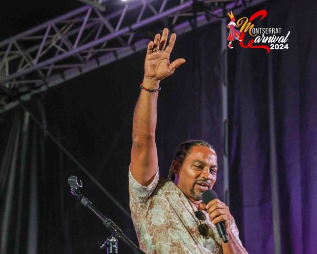 Parliamentary Secretary Crenston Buffonge declares the 2024 carnival open.