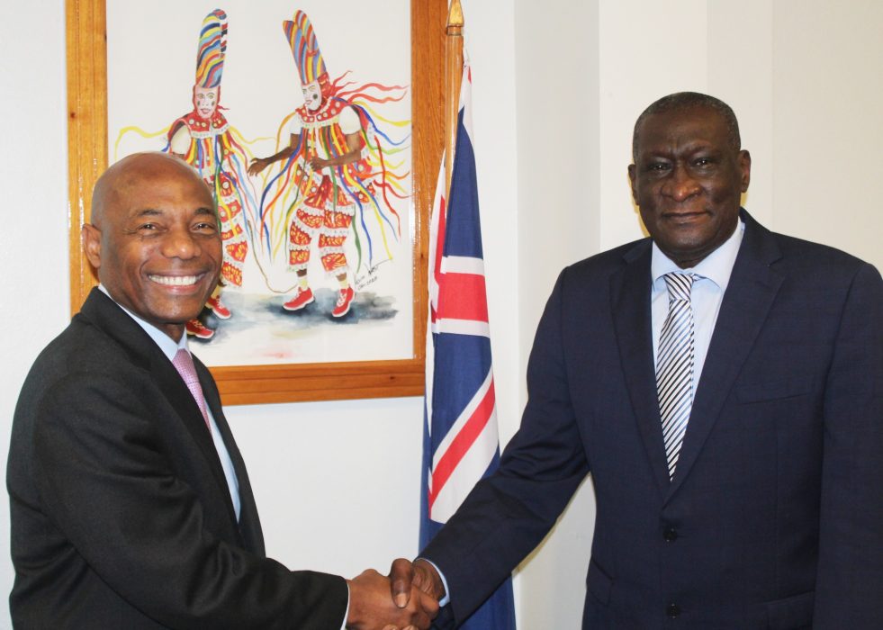 President of the Caribbean Development Bank (CDB), Dr. Hyginus ‘Gene’ Leon greets Premier Hon. Joseph E. Farrell in the Office of the Premier. (GIU Photo)