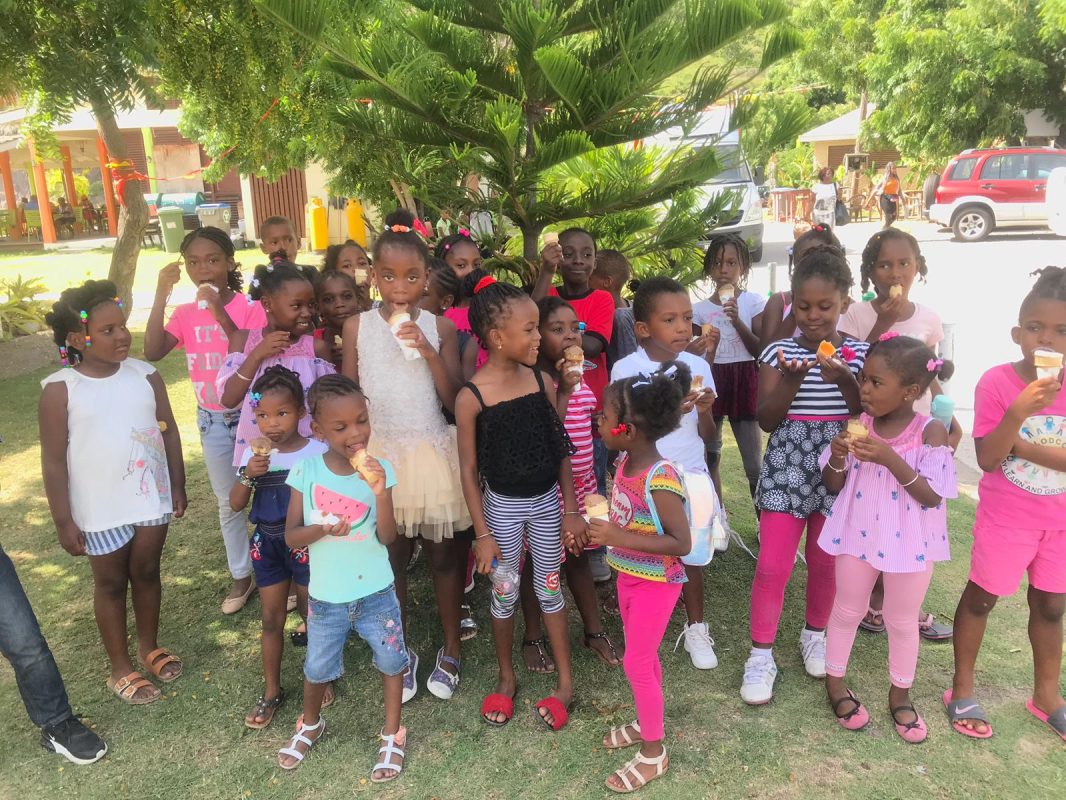 Children enjoy an ice cream at an Montserrat Children's Society summer camp (File Photo)