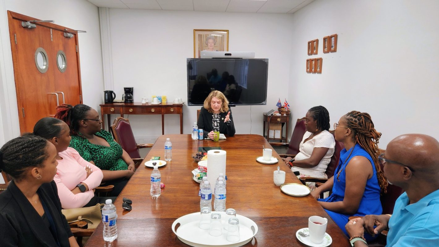 Governor Cross with members of the media.