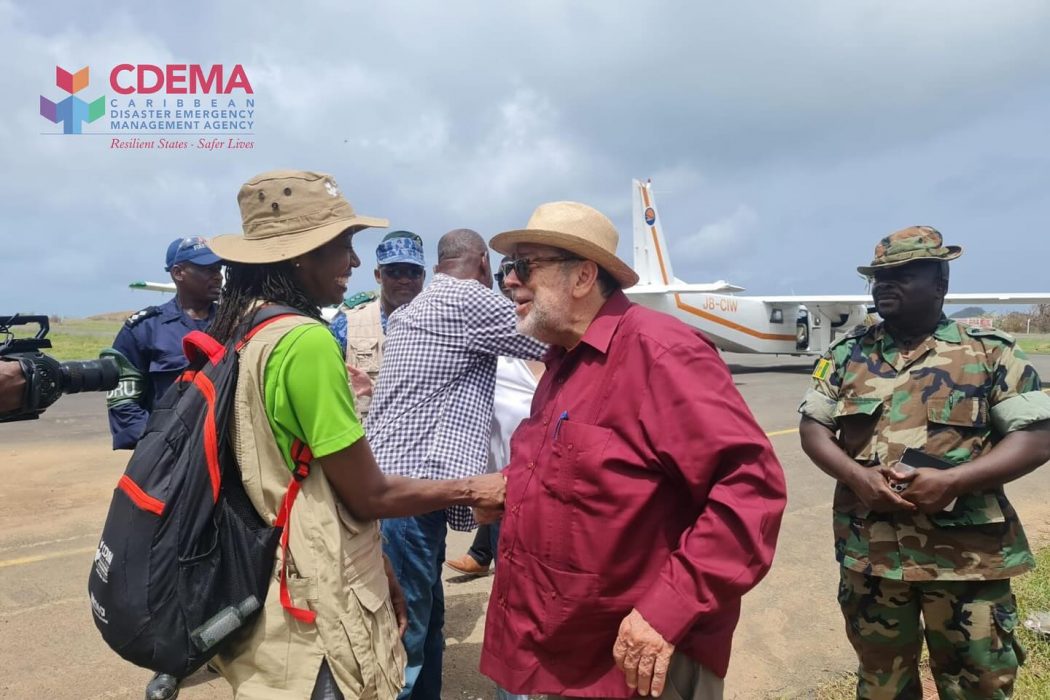 Prime Minister of St. Vincent and the Grenadines, the Hon. Ralph Gonsalves joins Executive Director of CDEMA, Ms. Elizabeth Riley and the team on the ground in Union Island. (CDEMA Photo)