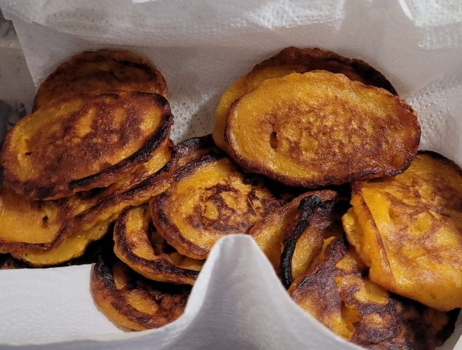 Place the fritters on paper towel to drain excess oil