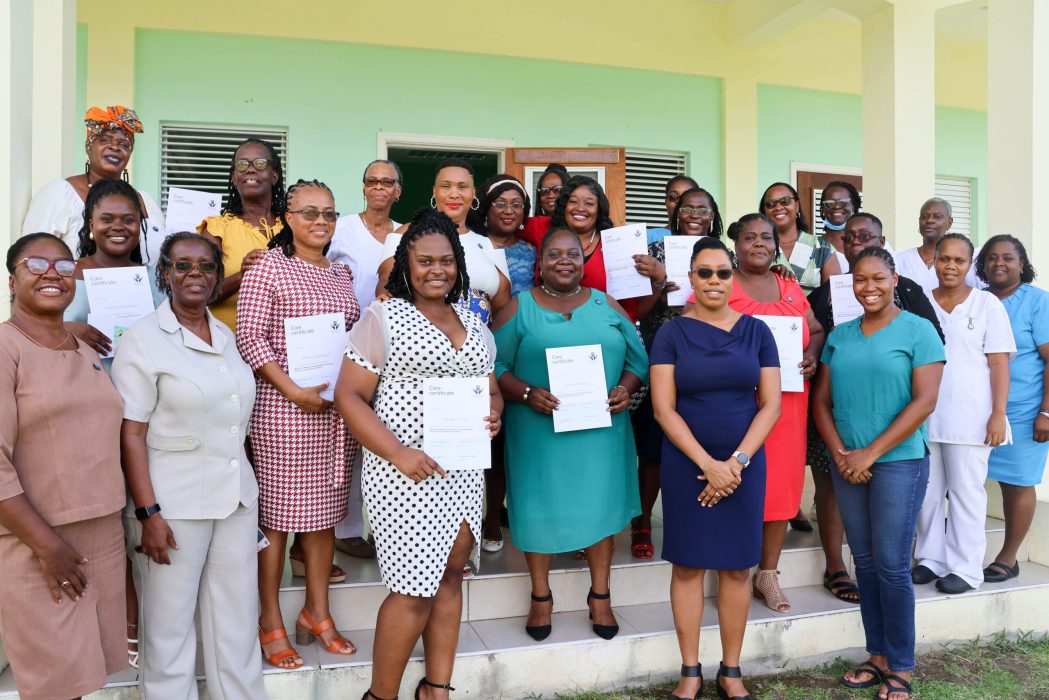 Graduates with facilitators, supporters and staff of the MoHSS