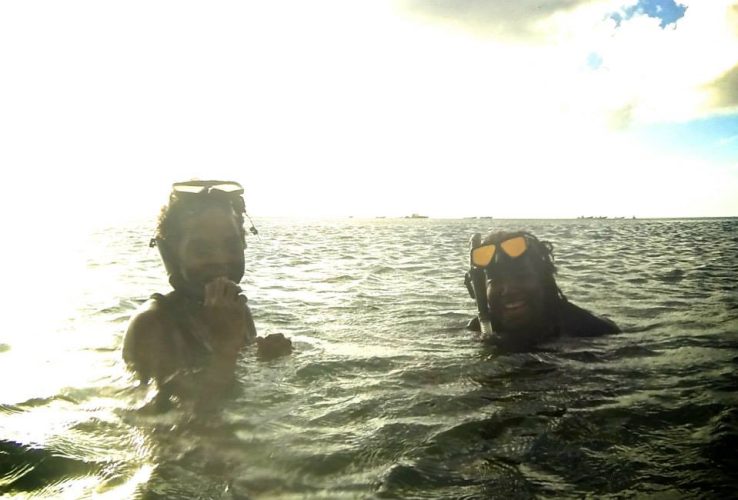 Veta Wade gives Nerissa Golden a snorkeling lesson (August 2014)