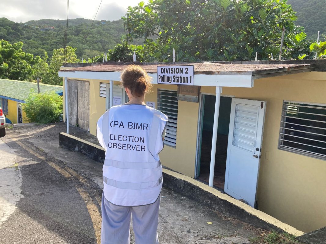 Observer outside polling station on election day