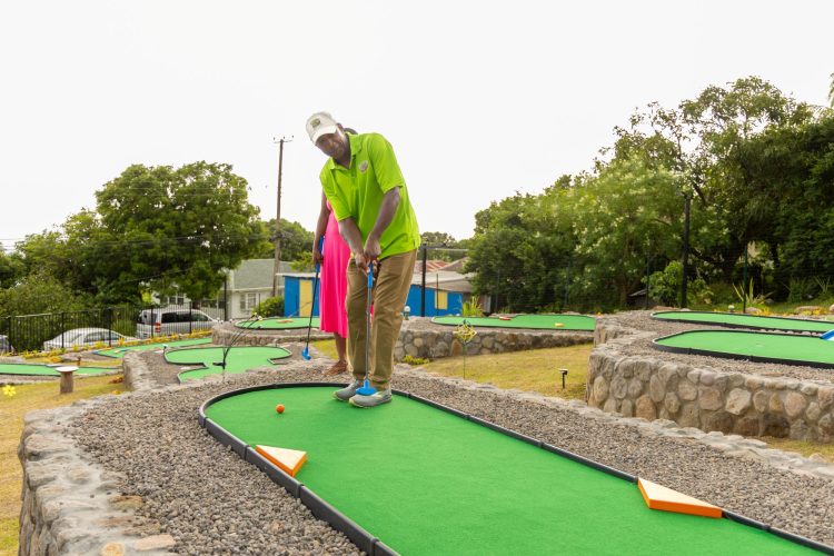 Enjoying a game of Roundabout Mini Golf